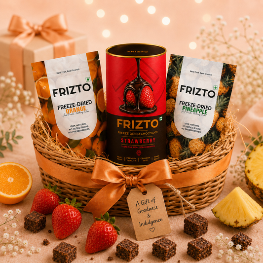 Basket of Frizto freeze-dried fruit and chocolate with a decorative bow, surrounded by fruits and treats.